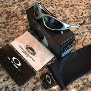 Silver and Black Oakley Sunglasses